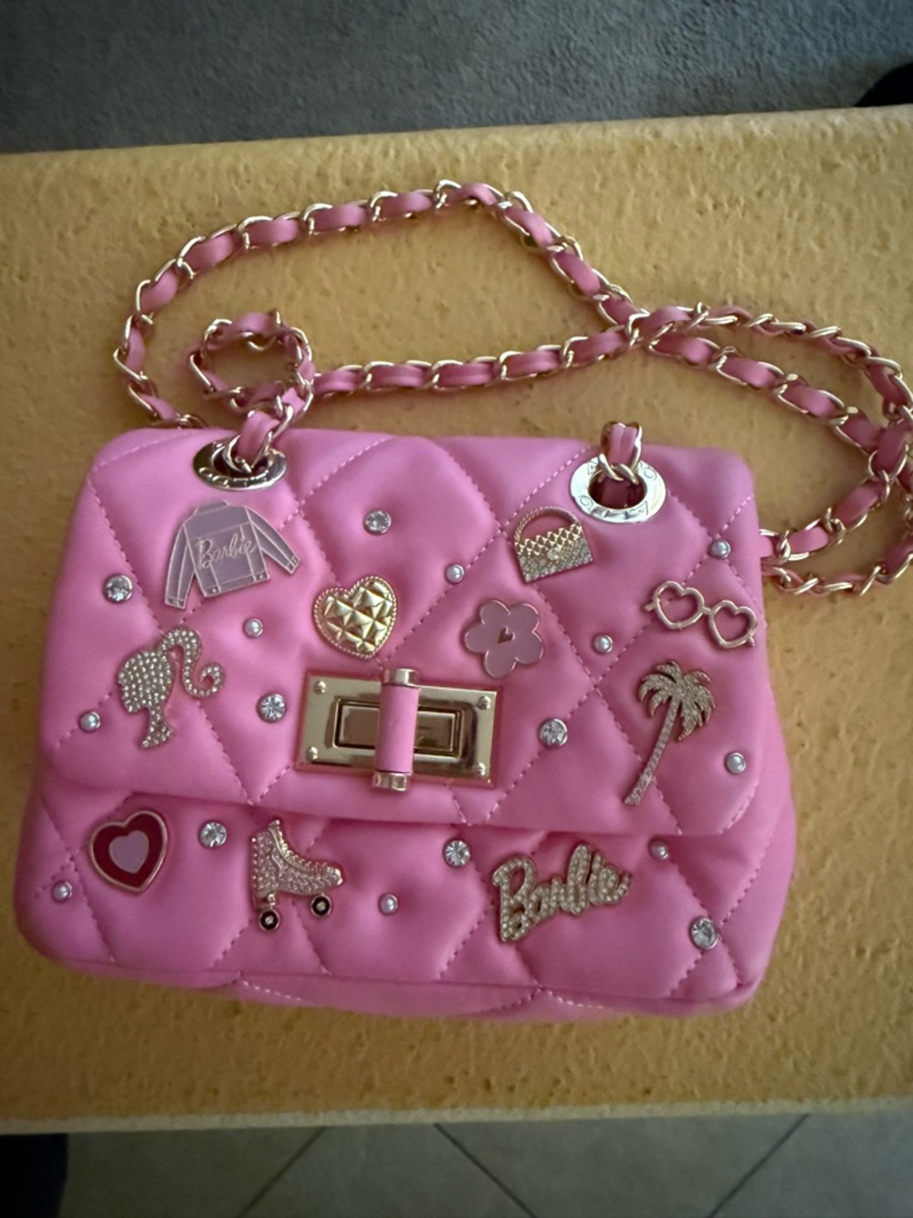 Barbie Pink Quilted Crossbody with Gold Chain & Charm Embellishments